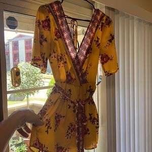 Yellow Romper with colorful red and pink flowers by TRIXXI size small no flaws